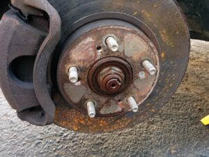 symptoms of an over torqued axle nut